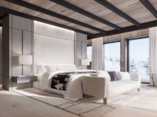 Luxurious mountain retreat boasting a stunning master bedroom with breathtaking views.