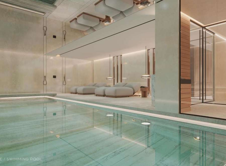 Indulge in luxury with this stunning indoor swimming pool and spa.