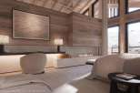 Luxurious master bedroom with stunning mountain views.