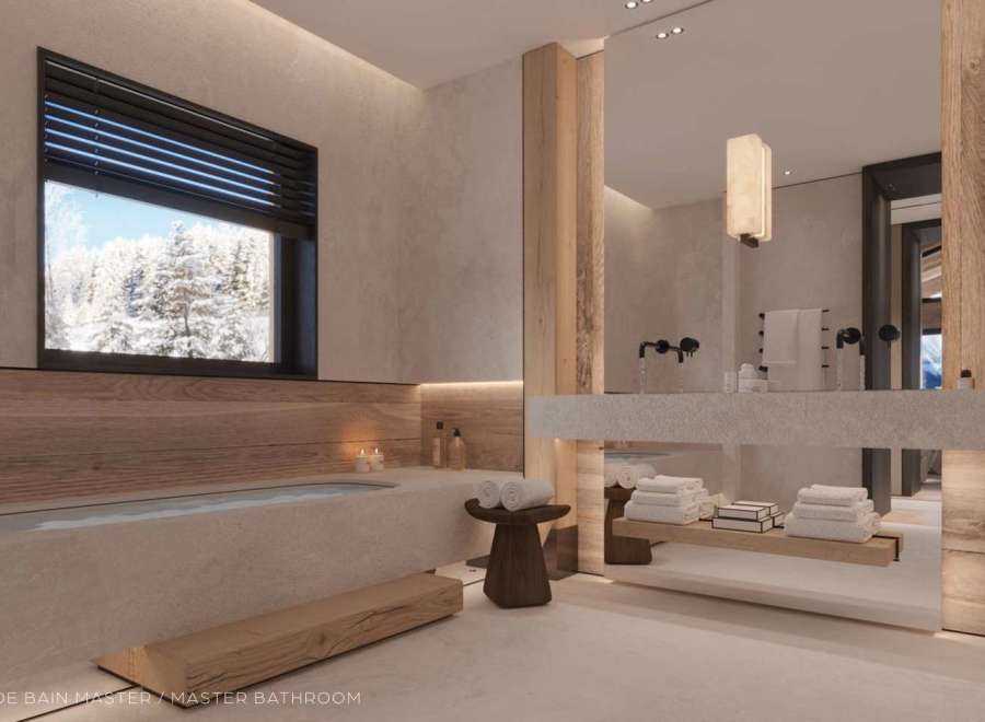 Luxurious master bathroom boasts a freestanding soaking tub, sleek floating vanity, and stunning mountain views.