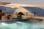 Luxury chalet with stunning mountain views and a private rooftop hot tub.