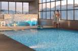 Indulge in our luxurious indoor pool, surrounded by stunning mountain views.