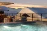 Luxury rooftop retreat with stunning mountain views and a private heated pool.
