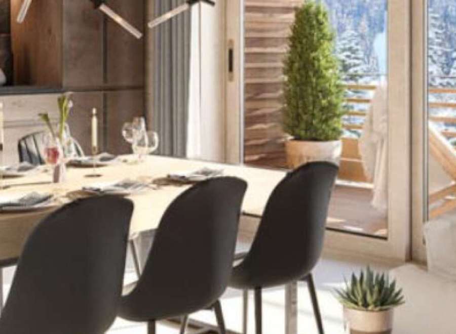 Luxury apartment with breathtaking mountain views and a spacious balcony.