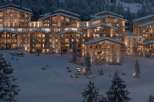 Luxury chalet-style apartments nestled in a snowy mountainside setting.