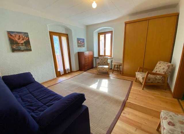 Discover a cozy living space with a touch of rustic charm.