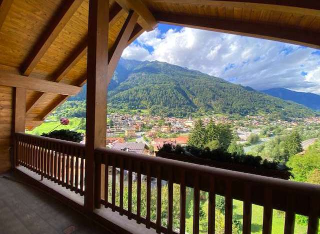 Enjoy breathtaking mountain views from this charming balcony.