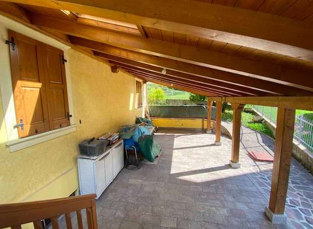 Discover the charm of this property featuring a covered patio, perfect for outdoor relaxation.