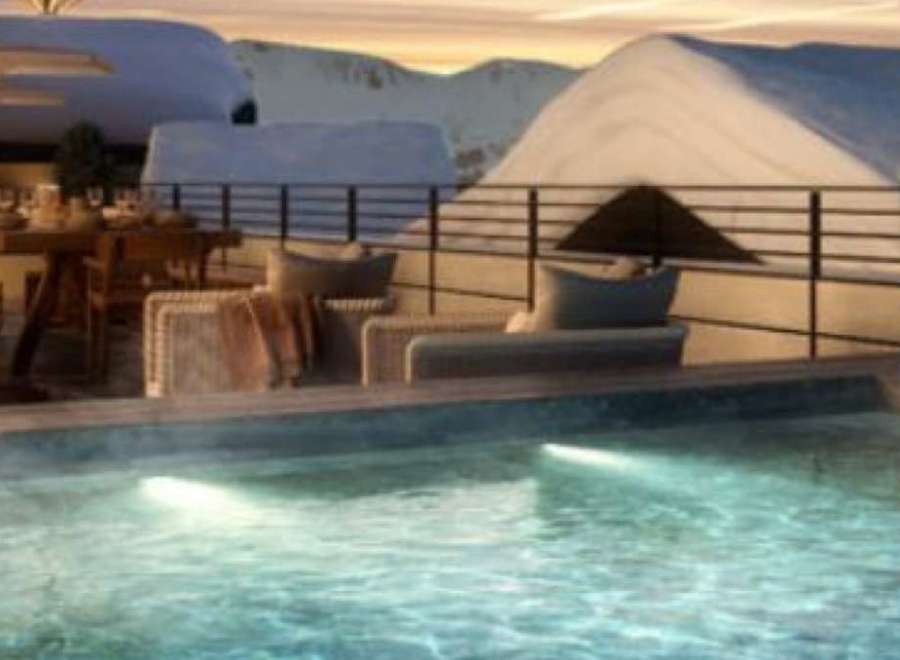 Luxury chalet with stunning mountain views and private rooftop pool.