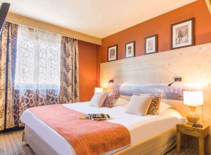Experience comfort and style in this inviting hotel room.
