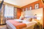 Experience comfort and style in this inviting hotel room.