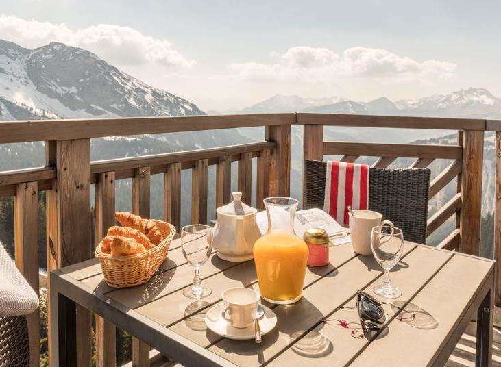 Enjoy breathtaking mountain views from this stunning balcony.