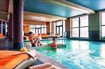 Relax and rejuvenate in this luxurious spa, featuring a stunning indoor pool.