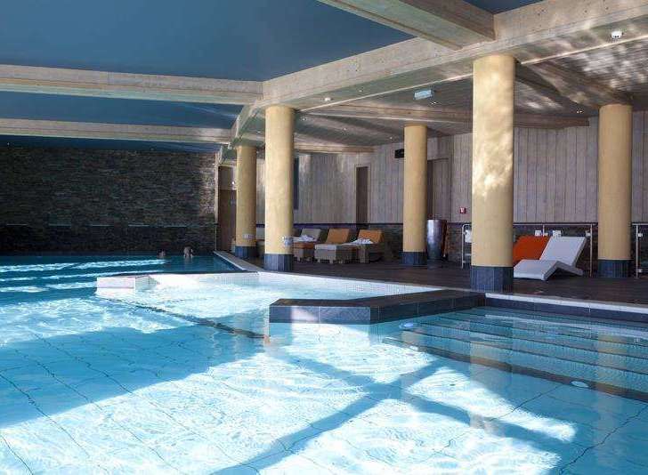 Indulge in ultimate relaxation at this luxurious indoor pool.