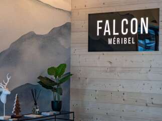 This stunning Méribel chalet boasts a stylish reception area with a sleek, modern design.