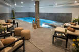 Indulge in the ultimate relaxation experience with this stunning indoor pool and spa.