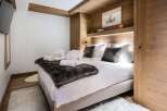 Experience luxury and comfort in this beautifully designed bedroom.