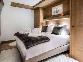Experience luxury and comfort in this beautifully designed bedroom.
