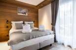 Experience luxury and comfort in this beautifully designed bedroom.