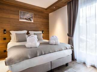 Experience luxury and comfort in this beautifully designed bedroom.