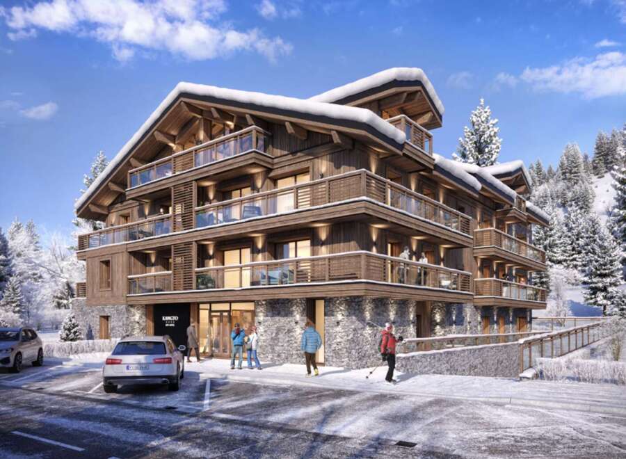 This stunning chalet-style apartment building boasts a prime location in a snowy mountain setting.