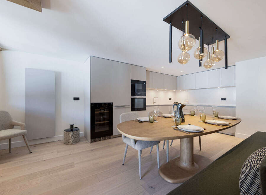 Experience modern luxury in this stunning property, featuring a beautifully designed kitchen with sleek cabinetry and top-of-the-line appliances.