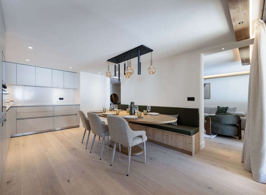 Experience modern elegance in this stunning property, featuring a beautifully designed dining area.