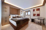 Experience luxury and comfort in this stunning bedroom.