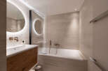 Step into a modern bathroom oasis, perfect for relaxation and rejuvenation.