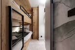 Discover the charm of this cozy bunk room, perfect for accommodating guests or family.