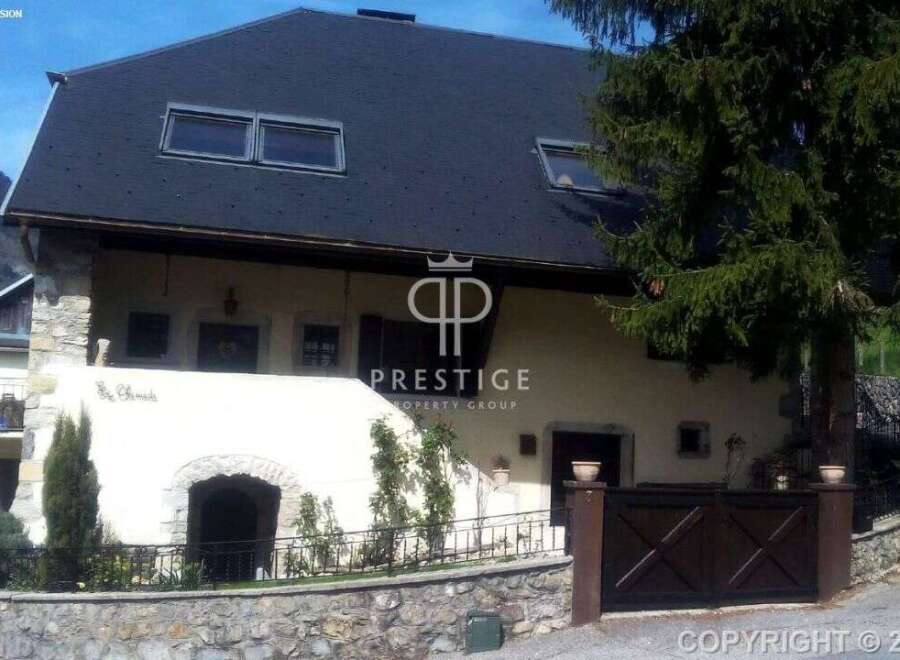 Discover a charming property with a unique architectural design.
