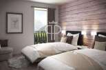 Discover a serene bedroom retreat with stunning mountain views.