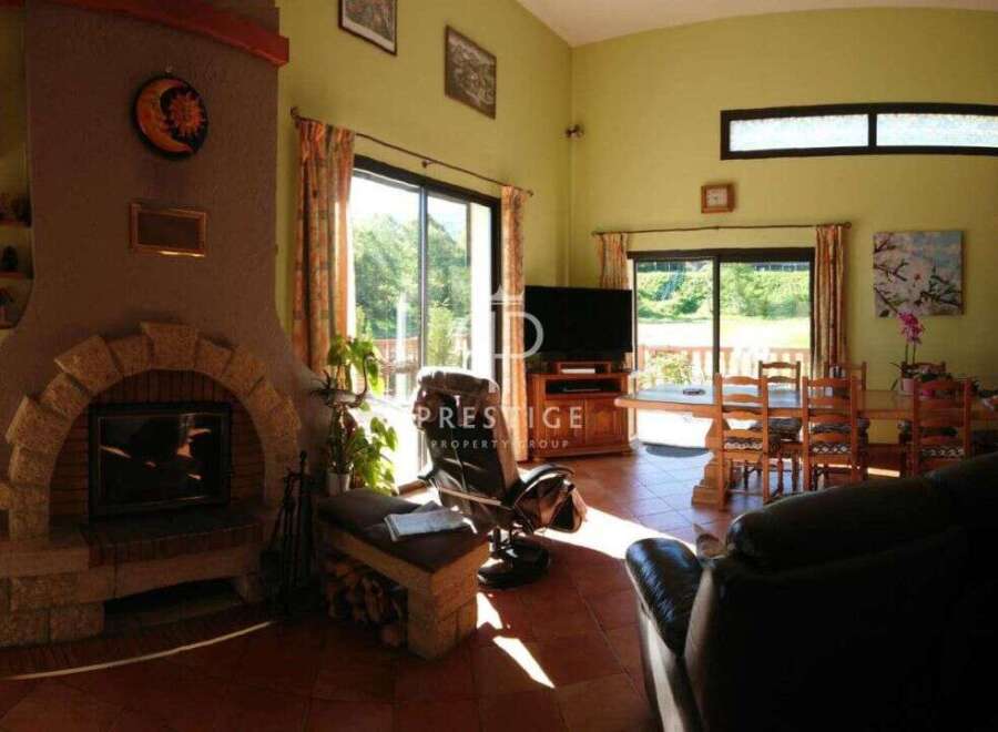 Discover a stunning property with a cozy fireplace, perfect for relaxing evenings.