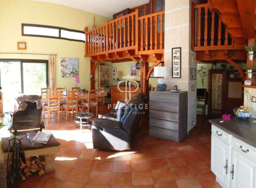 Discover the charm of this stunning property, featuring a unique mezzanine and a warm, inviting atmosphere.