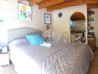 Discover a charming bedroom with a cozy ambiance.