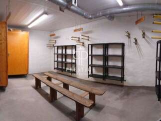 Discover a unique property with a functional storage area.