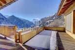 Experience breathtaking mountain views from this stunning property.