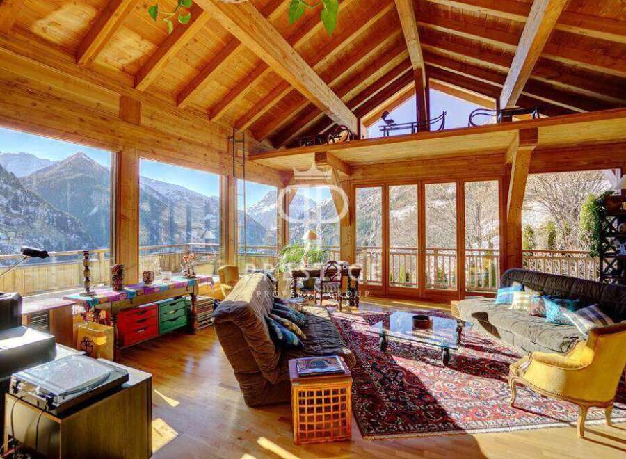 Experience the epitome of luxury living in this stunning chalet, boasting breathtaking mountain views.