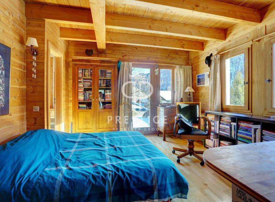 Experience the charm of this cozy wooden cabin, perfect for a relaxing getaway.