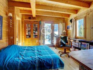 Experience the charm of this cozy wooden cabin, perfect for a relaxing getaway.