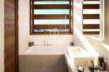 Experience luxury in this stunning bathroom.