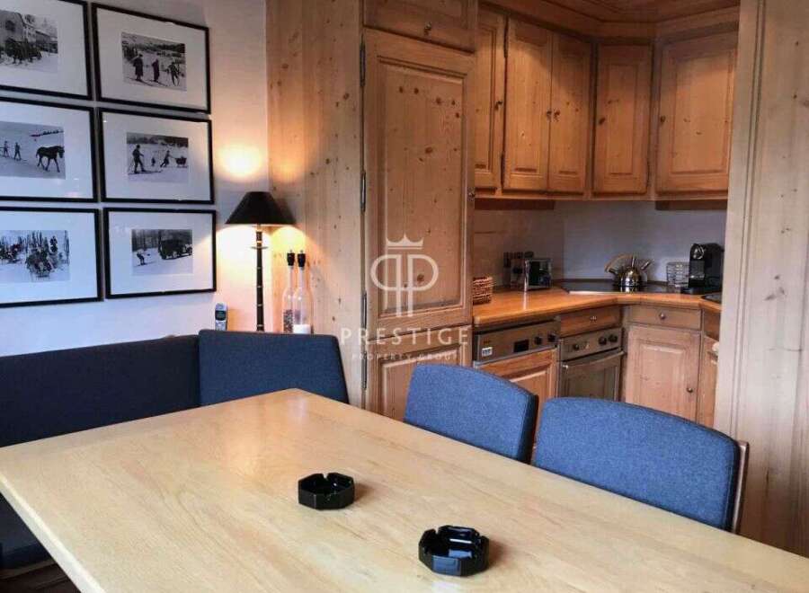 Discover a charming property with a cozy dining area, perfect for intimate gatherings.