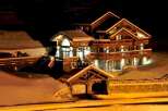 Experience luxury living in this stunning chalet, perfect for a winter getaway.