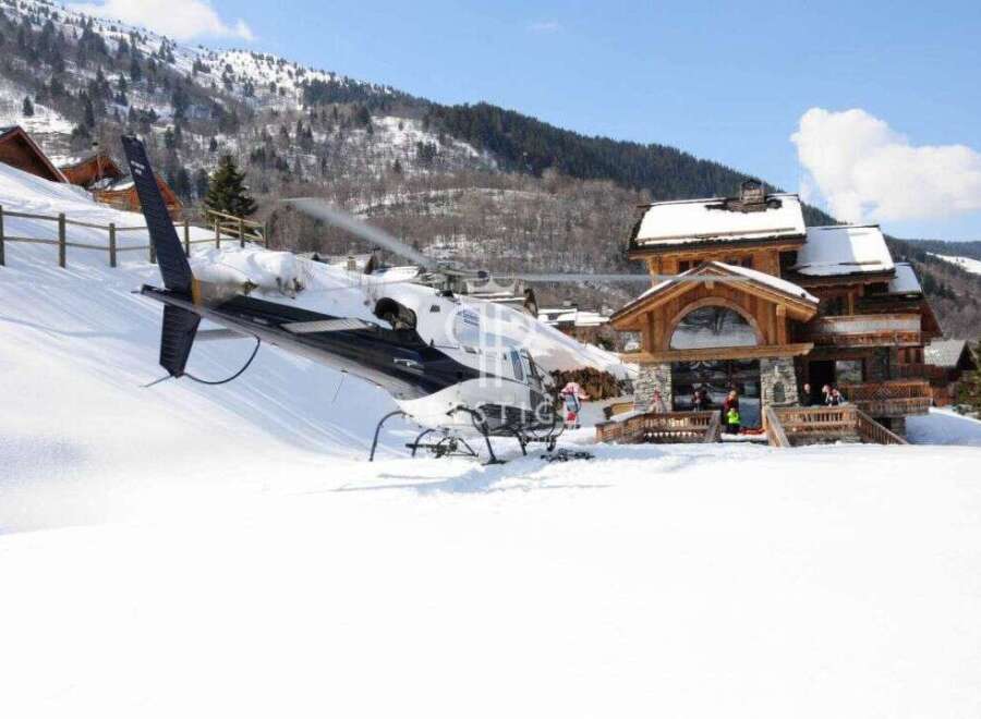 Experience luxury in this stunning chalet, complete with a private helicopter landing.