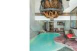 Experience luxury in this stunning property featuring a unique indoor pool.
