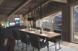 Experience luxury living in this stunning property, featuring a beautifully designed dining area.