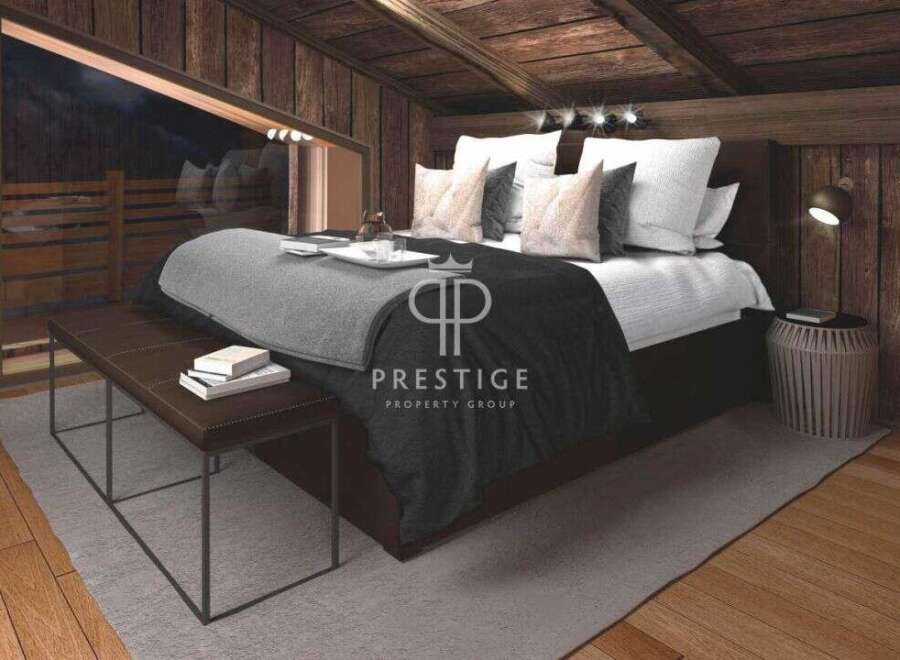 Experience luxury living in this stunning bedroom.