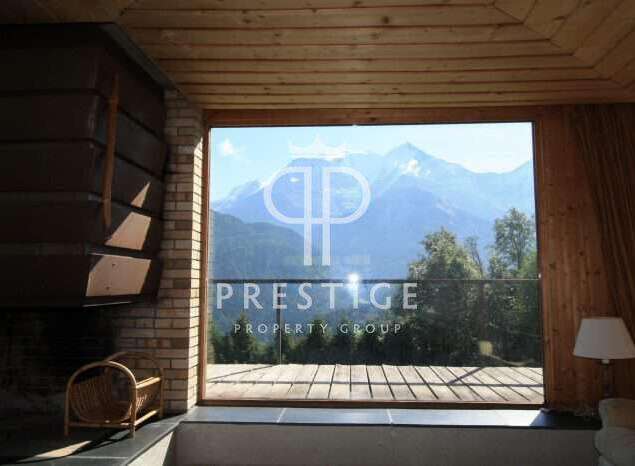 Experience breathtaking mountain views from this stunning property.