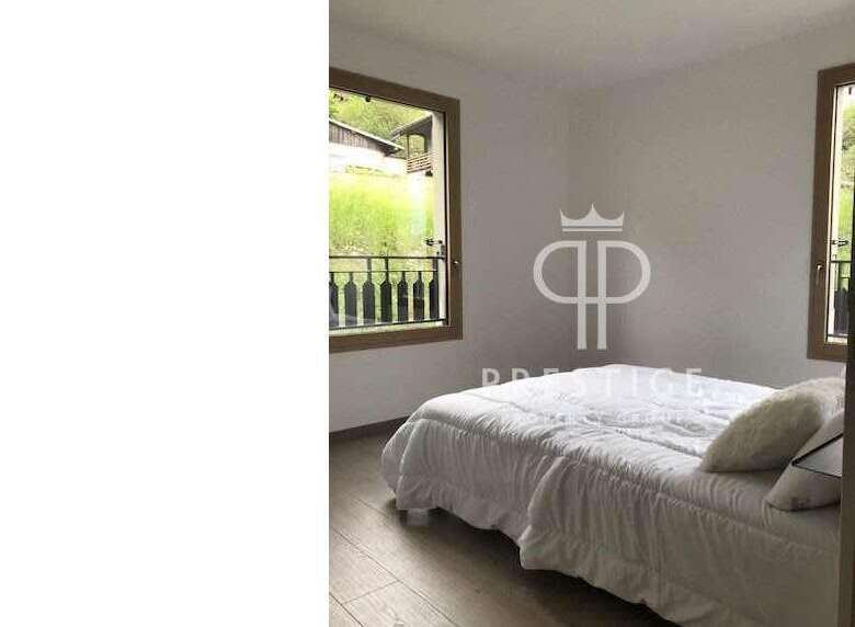 Discover a serene bedroom with a view.
