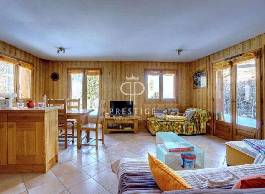 Discover the charm of this cozy property, featuring warm wooden interiors and a welcoming atmosphere.